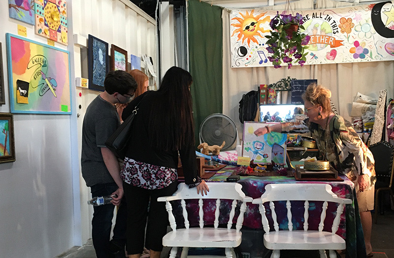 1art teacher Valerie showing childrens art