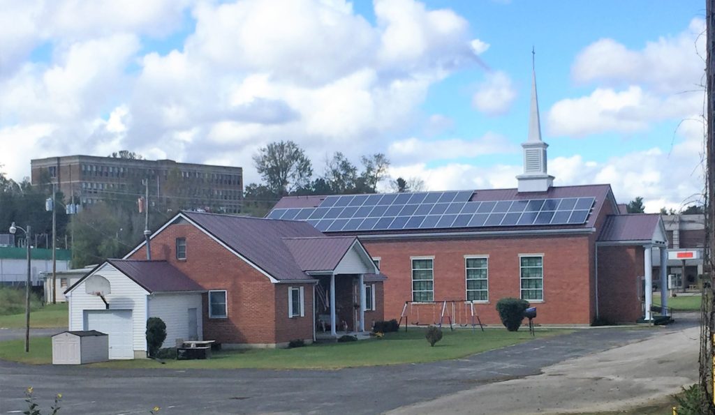 Solar PV panels sit on the roof at Campton Baptist Church in Wolfe County. Many Eastern Kentucky churches struggle with their bills