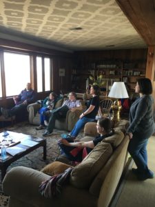MACED staff stand in a circle. They are dedicated to eastern kentucky business owners and entreprenuers