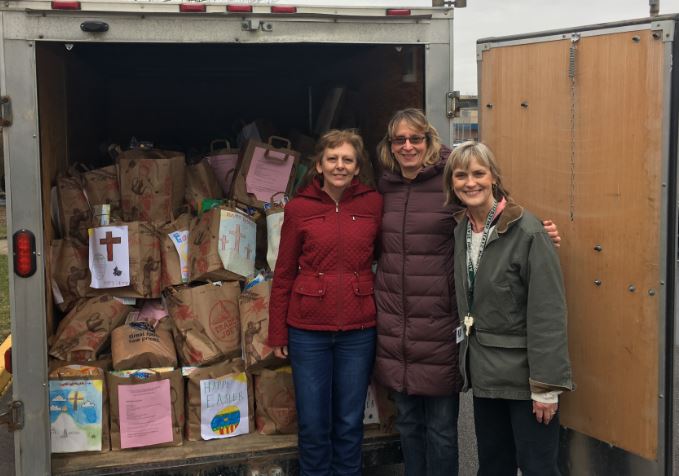 Nancy Hamann with Queen of All Saints Outreach Ministry programs 