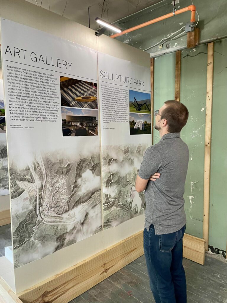 One person reads the exhibit information in hazard kentucky
