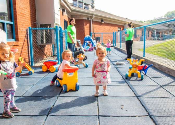 Kids play outside at New Beginnings in HAzard Kentucky. Appalachian Early Childhood Network supports the facility and others in eastern ky