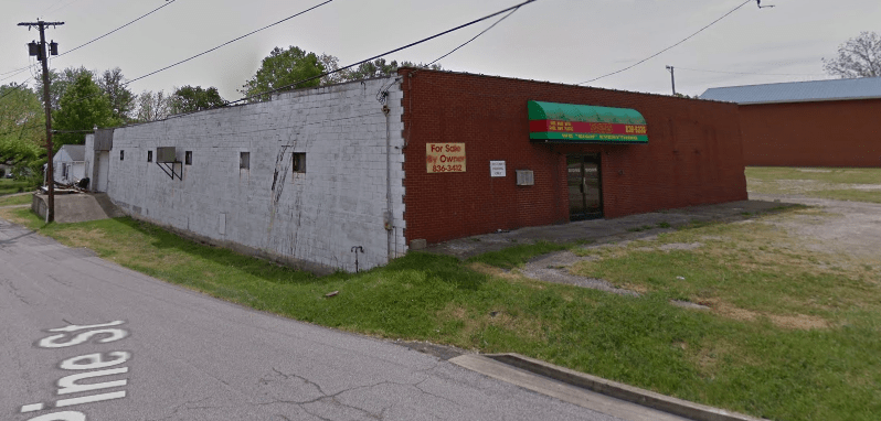 The print my threads building before it was painted. The business is a social enterprise in eastern kentucky that MACED Supports with loans