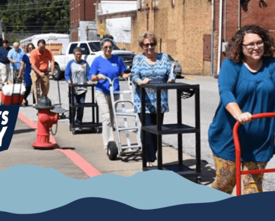 A group does a sidewalk accessibility test in Harlan, Kentucky