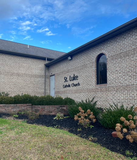 A view of st luke in magoffin county from outside of the front of the church.